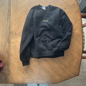 Aritzia Black Crewneck with Gold Script Logo